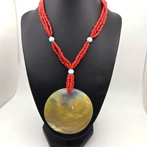 Elegant red coral bead necklace with shell pendant and multi-strand real stones